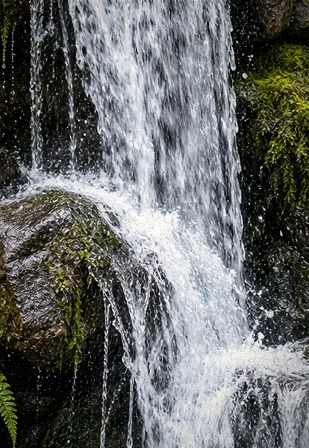 White water over dark stone